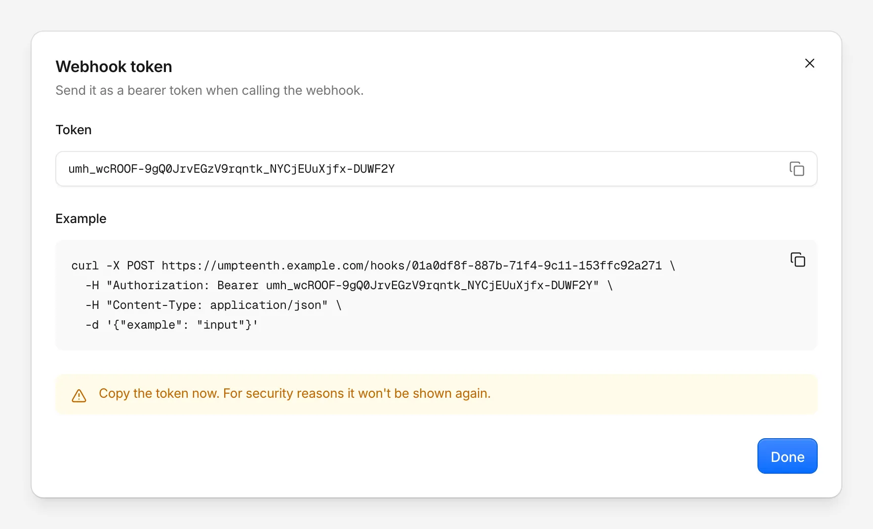 The Webhook token dialog with the token, a copyable example curl call and a warning that the token won't be shown again
